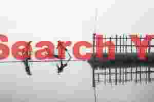 Fishermen crossing the gate into Golden Island Cottages