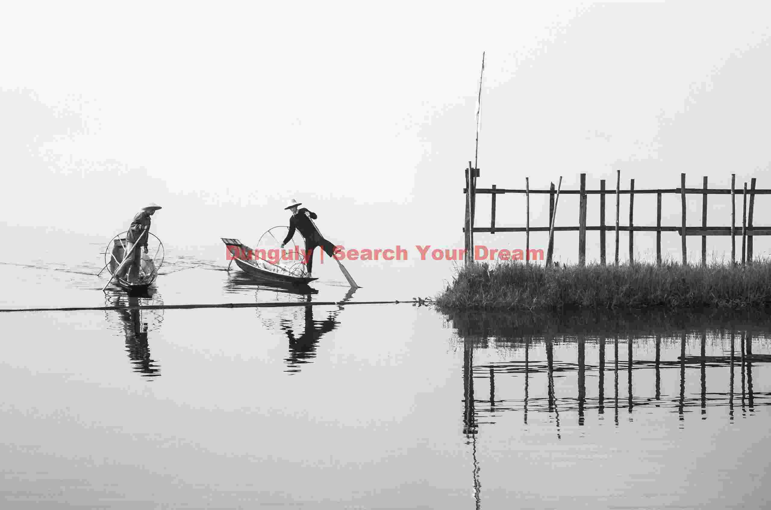 Fishermen crossing the gate into Golden Island Cottages