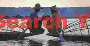 Fishermen sharing a light