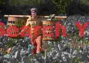 Girl carrying shoulder baskets