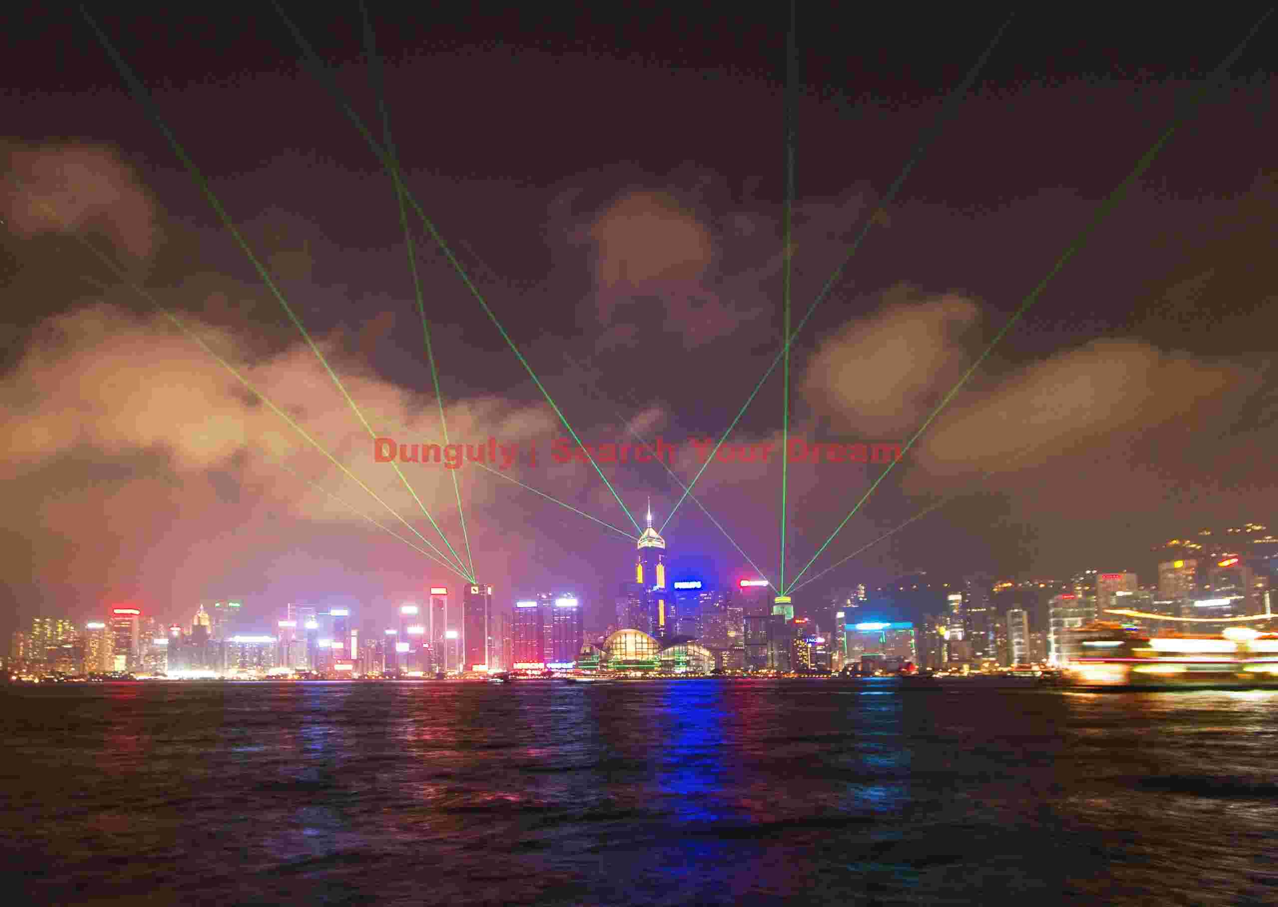 Hong Kong cityscape with laser beams