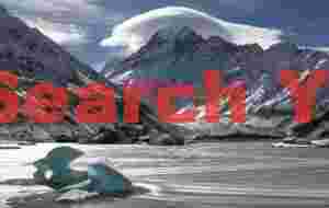 Icebergs below cloud-capped Mt. Cook