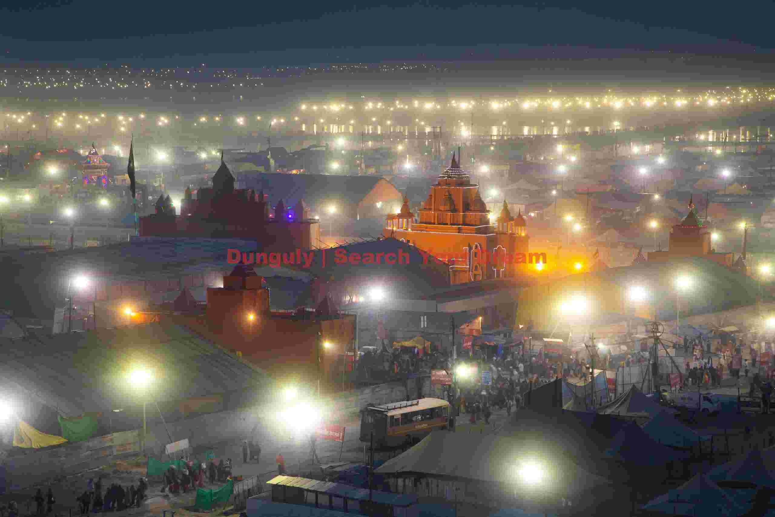 Lights of the Kumbh mela through the haze