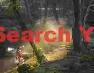 Man clearing and burning leaves and trash on riverbank