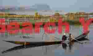 Misty morning, two fishermen