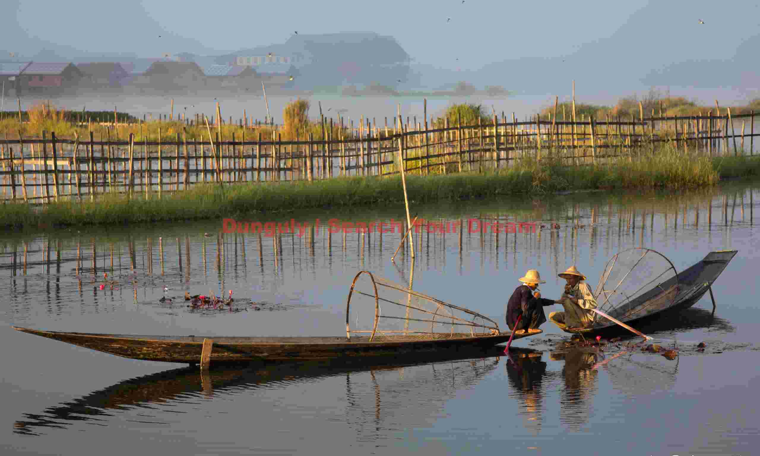 Misty morning, two fishermen