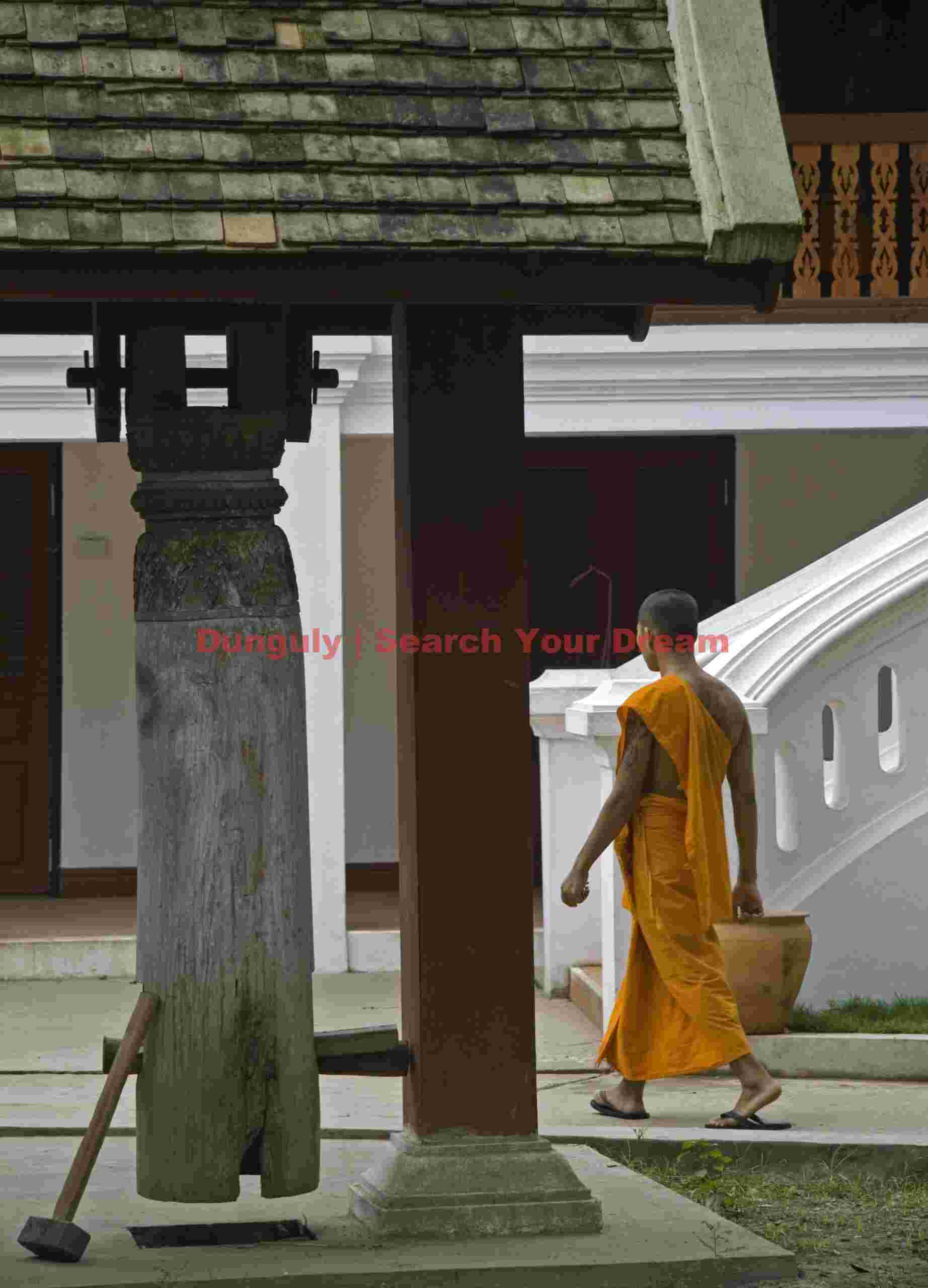 Monk and temple bell