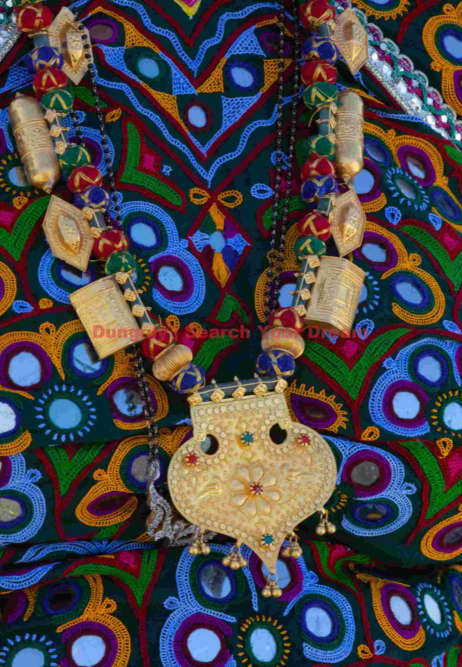 Necklace and embroidery