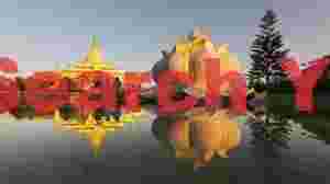 Reflections of pagoda and lotus flower sculpture