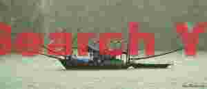 Squid fishing boat in squall