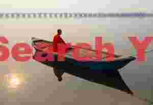 Sunrise boat scene on the Ganges